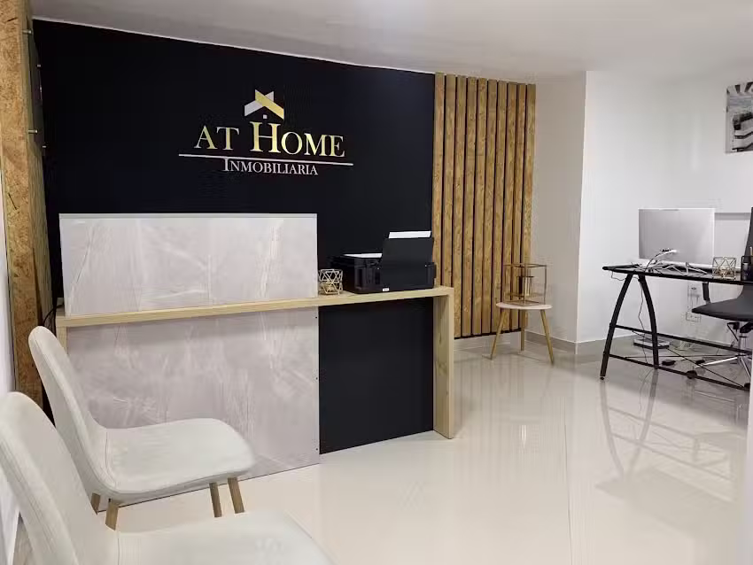 AT-HOME INMOBILIARIA